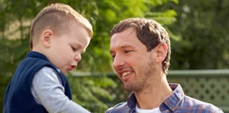 Father looks at son width 960
