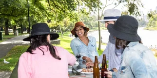 Friends eat at barbeque width 960