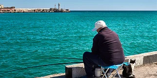 Shutterstock 1097255405 male fishing