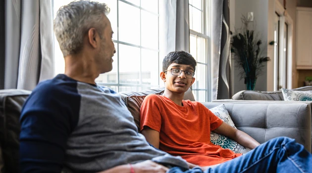 Father and son talking about vaping