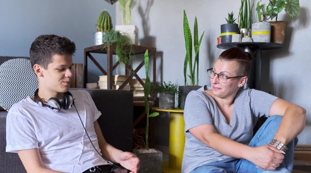 Parent speaking to son about vaping