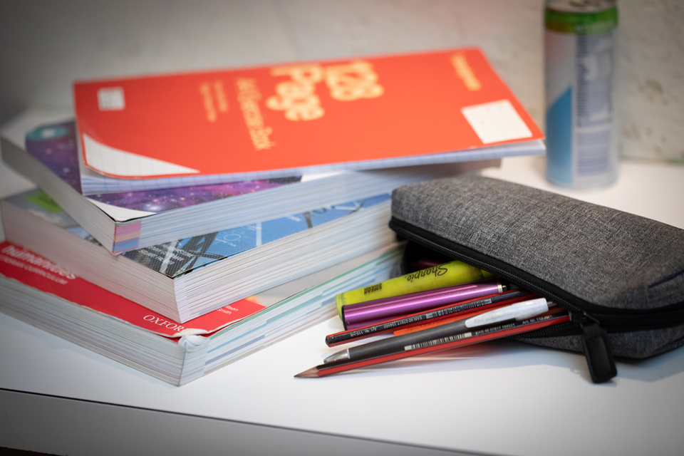 A vape hidden amongst stationary in a pencil case.